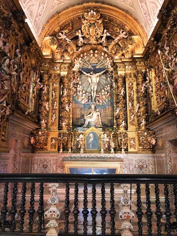 A stunning view of the chapel inside Igreja de São Roque, showcasing the Baroque splendor of the architecture.